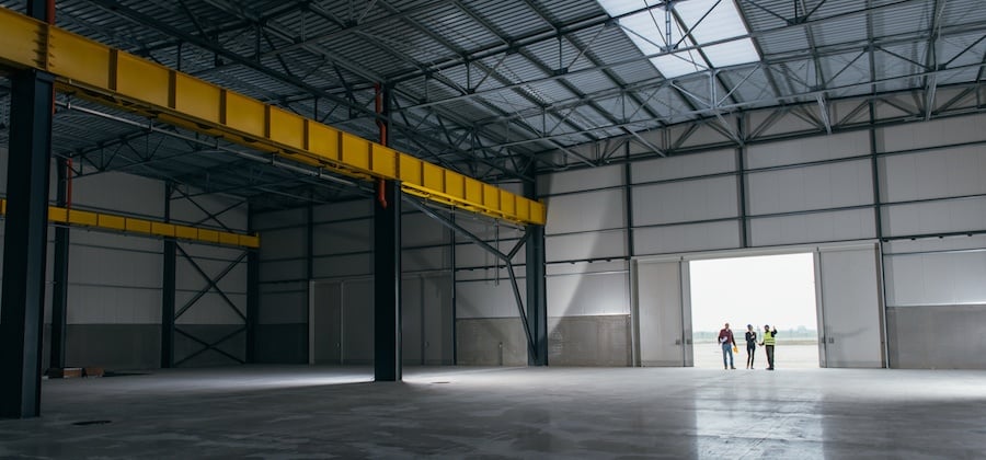realtor-in-empty-warehouse